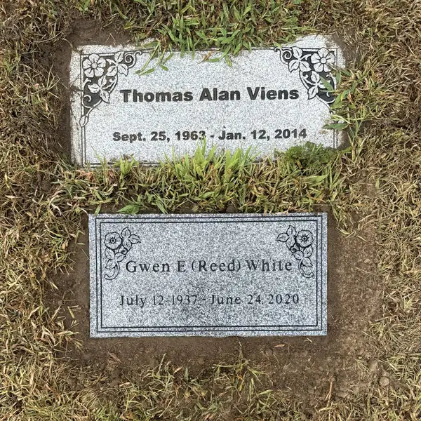 Flat granite marker — Champlain Monuments