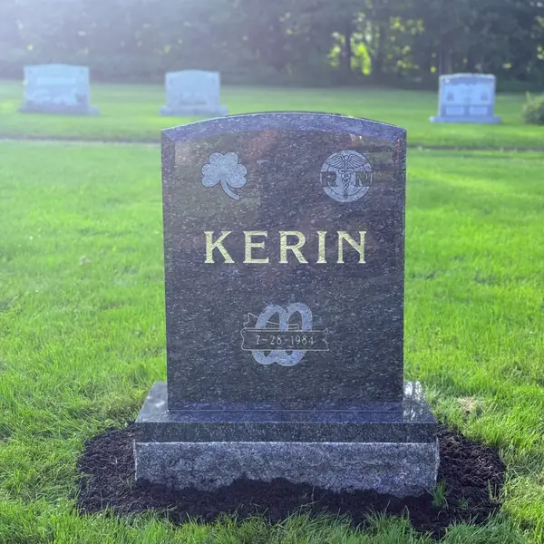 Classic upright granite monument — example 16