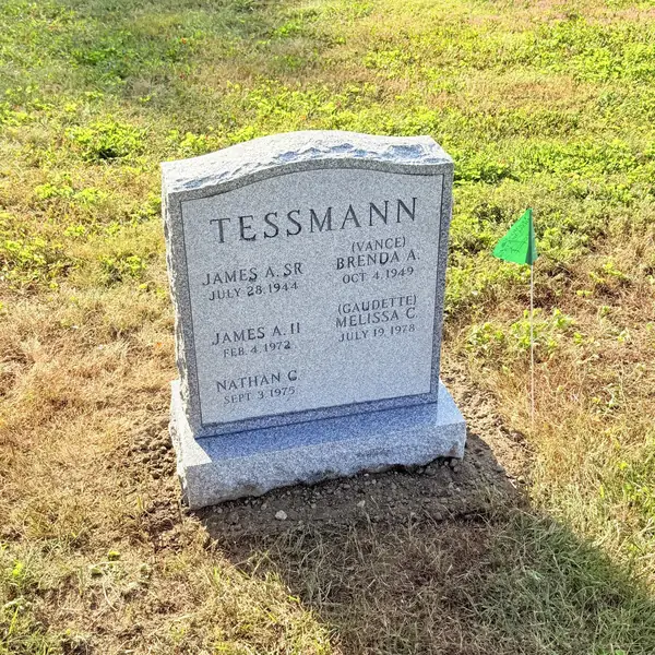 Classic upright granite monument — example 23